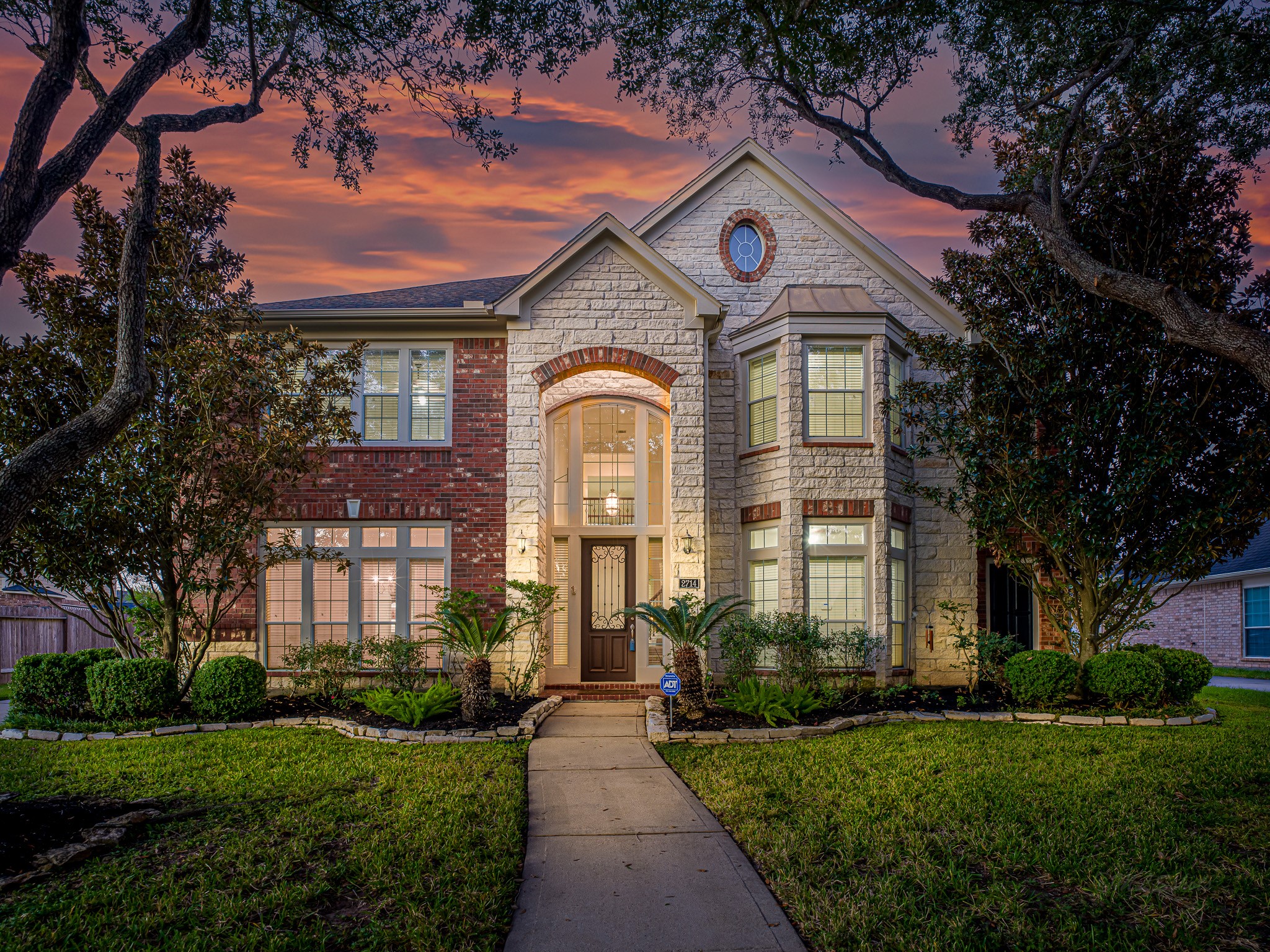 2714 Misty River Lane Richmond, TX 77406 - Photo 1 of 50 a front view of a house with a garden