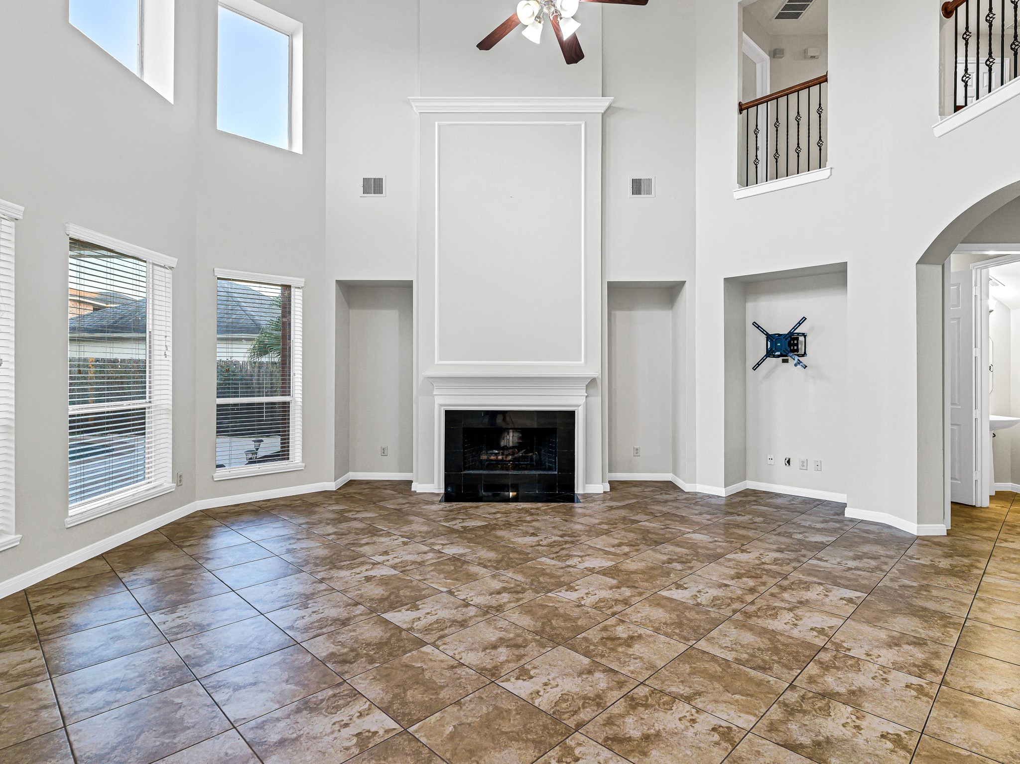 2714 Misty River Lane Richmond, TX 77406 - Photo 19 of 50 a view of an empty room with a fireplace