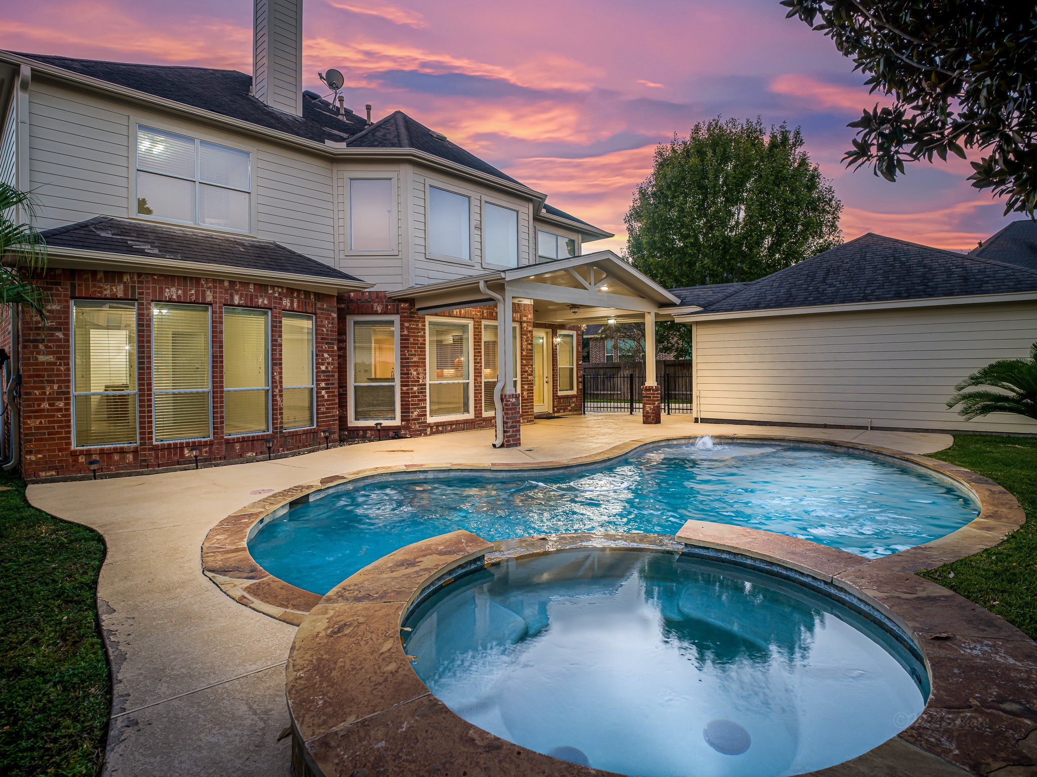2714 Misty River Lane Richmond, TX 77406 - Photo 2 of 50 a view of a house with swimming pool