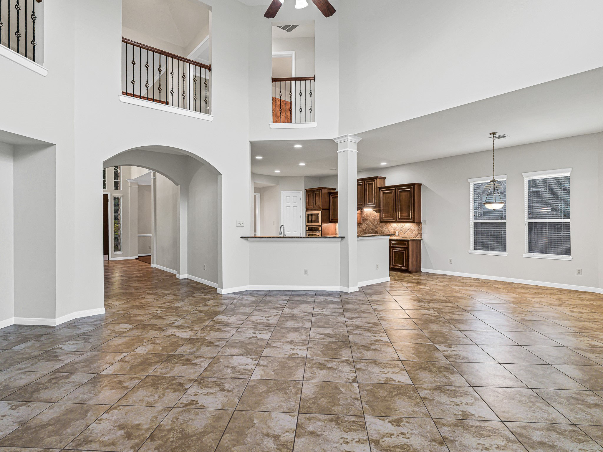 2714 Misty River Lane Richmond, TX 77406 - Photo 21 of 50 a view of a kitchen with a sink and an open kitchen view