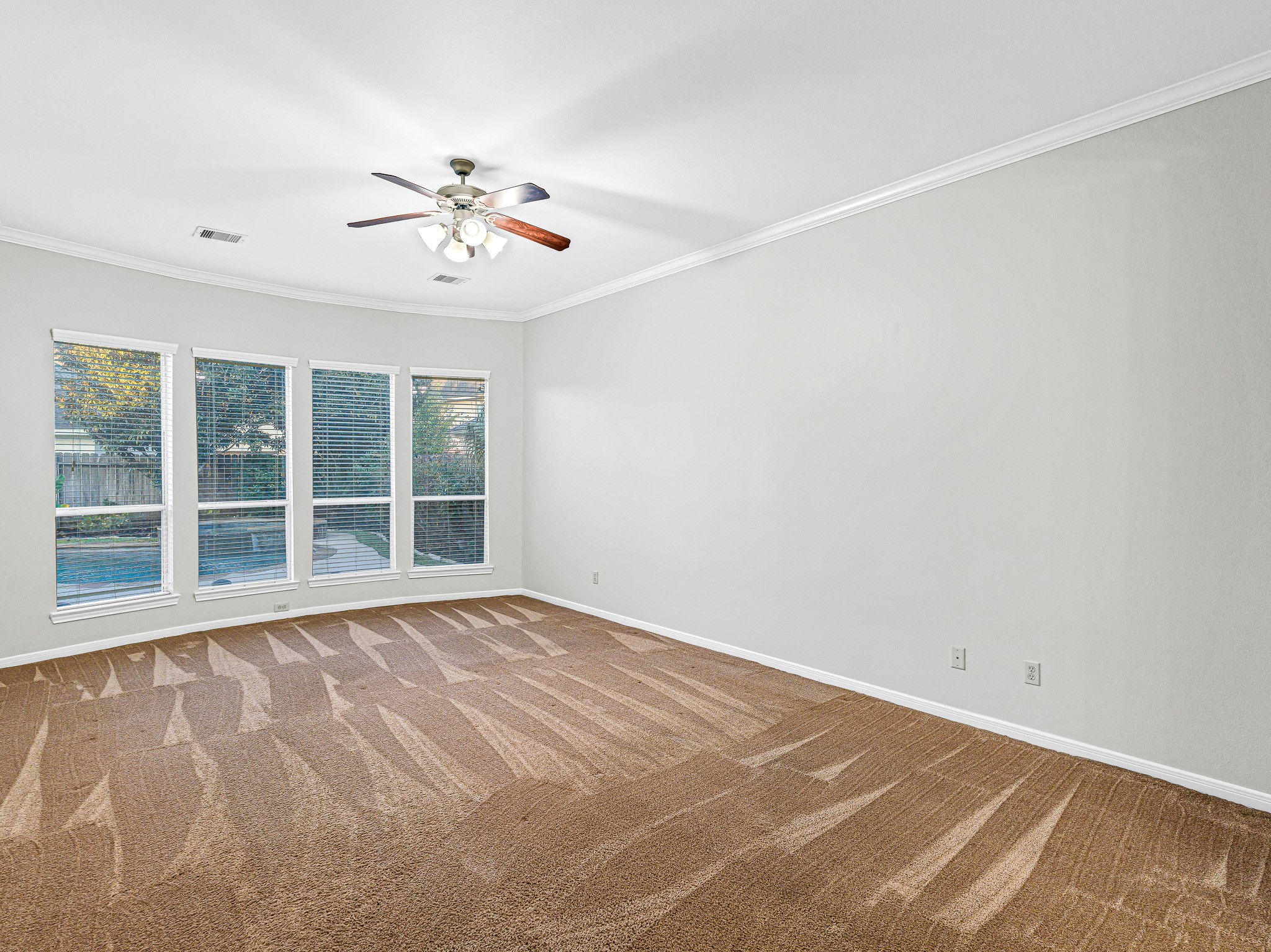 2714 Misty River Lane Richmond, TX 77406 - Photo 22 of 50 a view of an empty room with a window