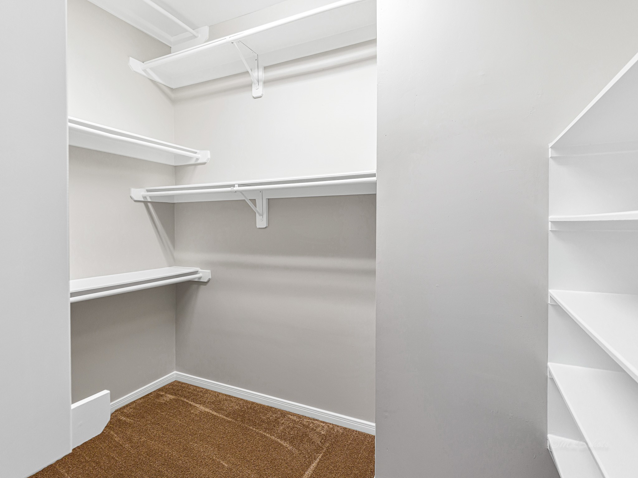 2714 Misty River Lane Richmond, TX 77406 - Photo 28 of 50 a view of an empty walk in closet