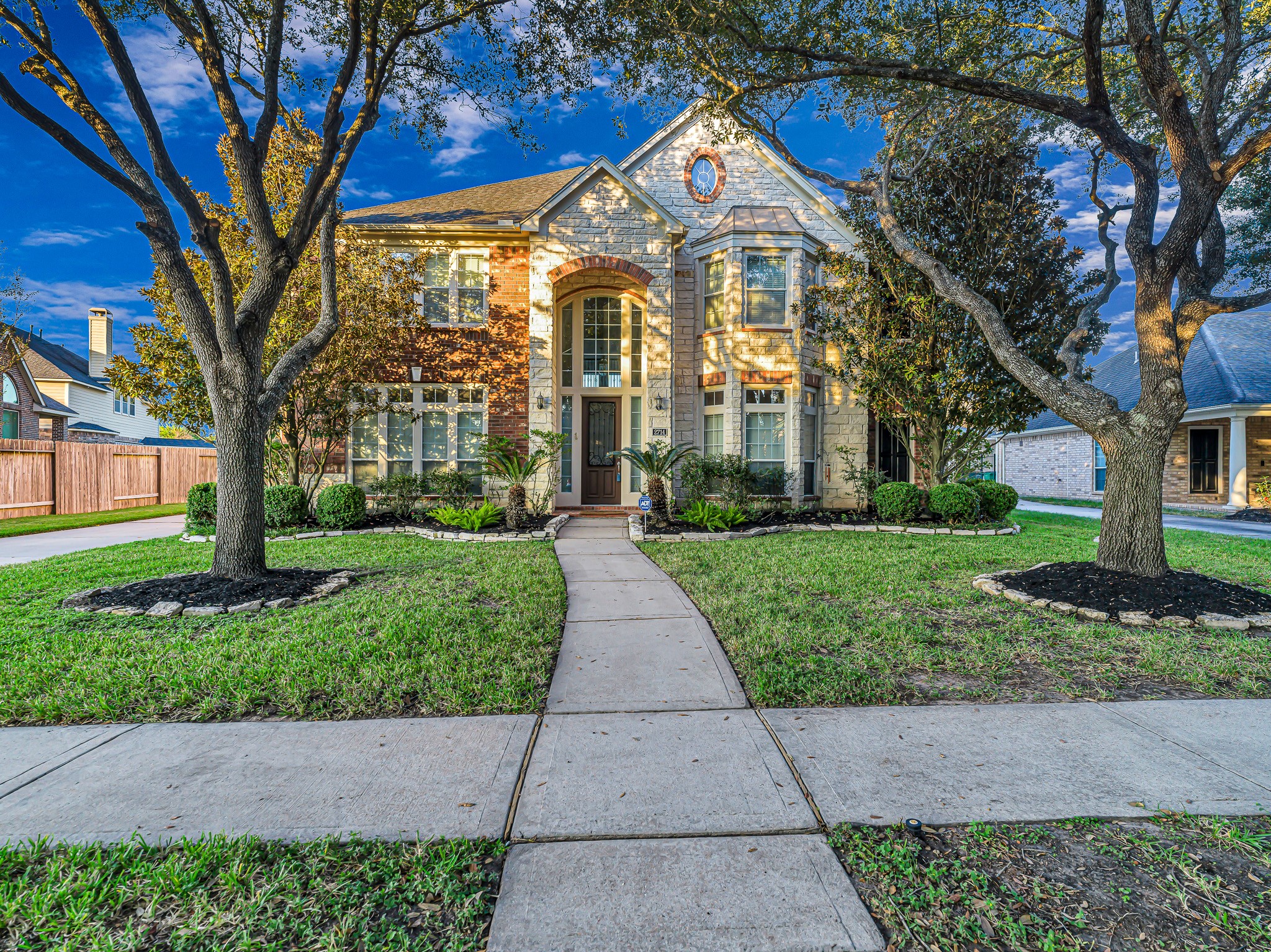 2714 Misty River Lane Richmond, TX 77406 - Photo 3 of 50 a front view of a house with a yard