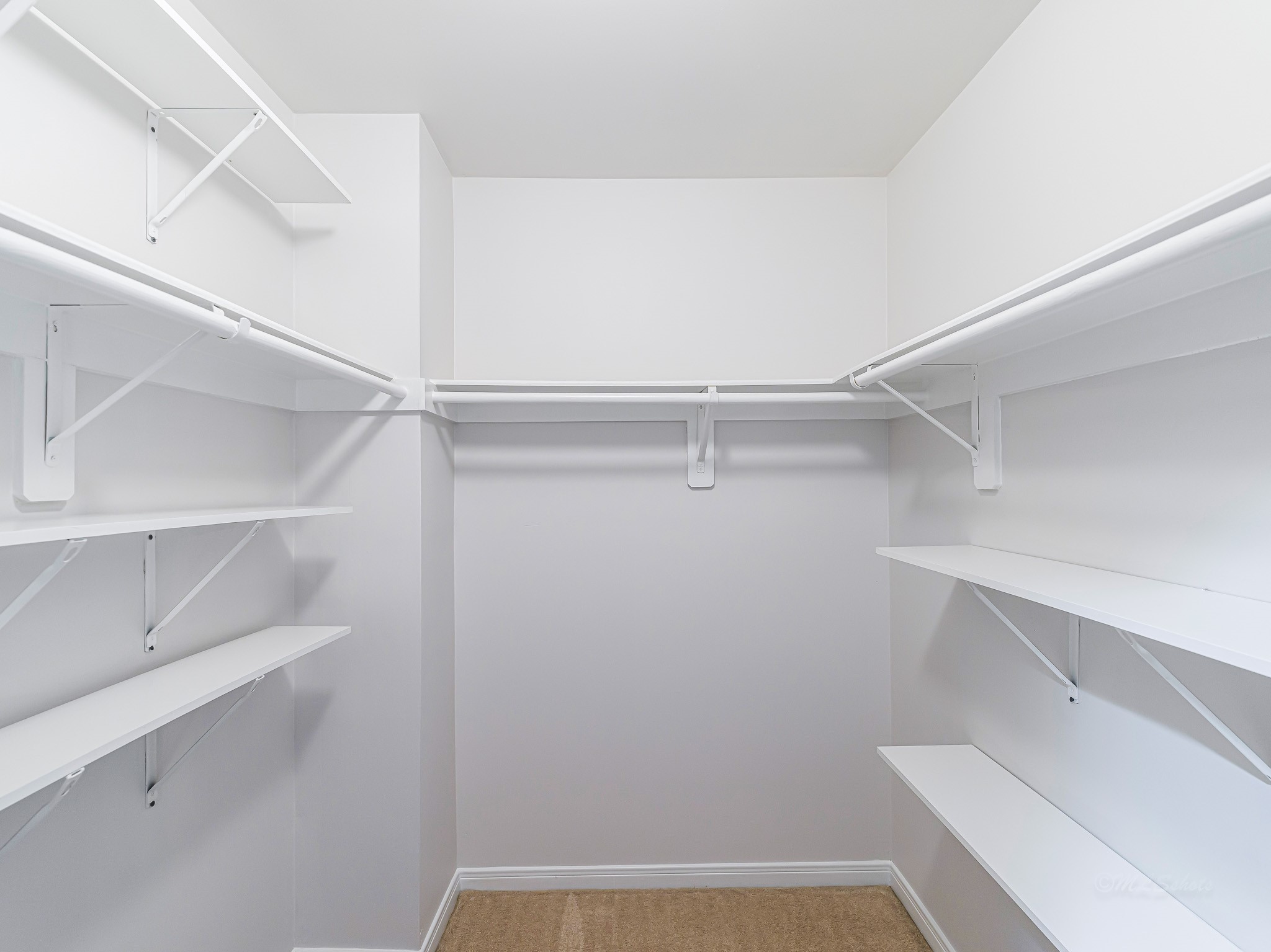 2714 Misty River Lane Richmond, TX 77406 - Photo 36 of 50 a view of an empty walk in closet