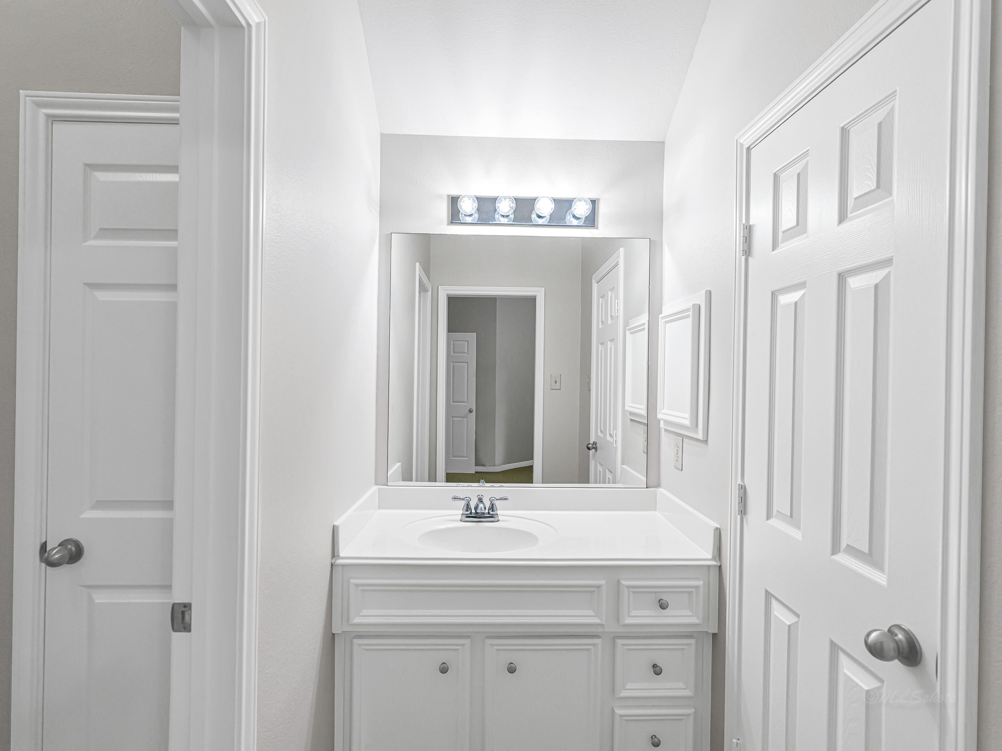 2714 Misty River Lane Richmond, TX 77406 - Photo 39 of 50 a bathroom with a sink and a mirror