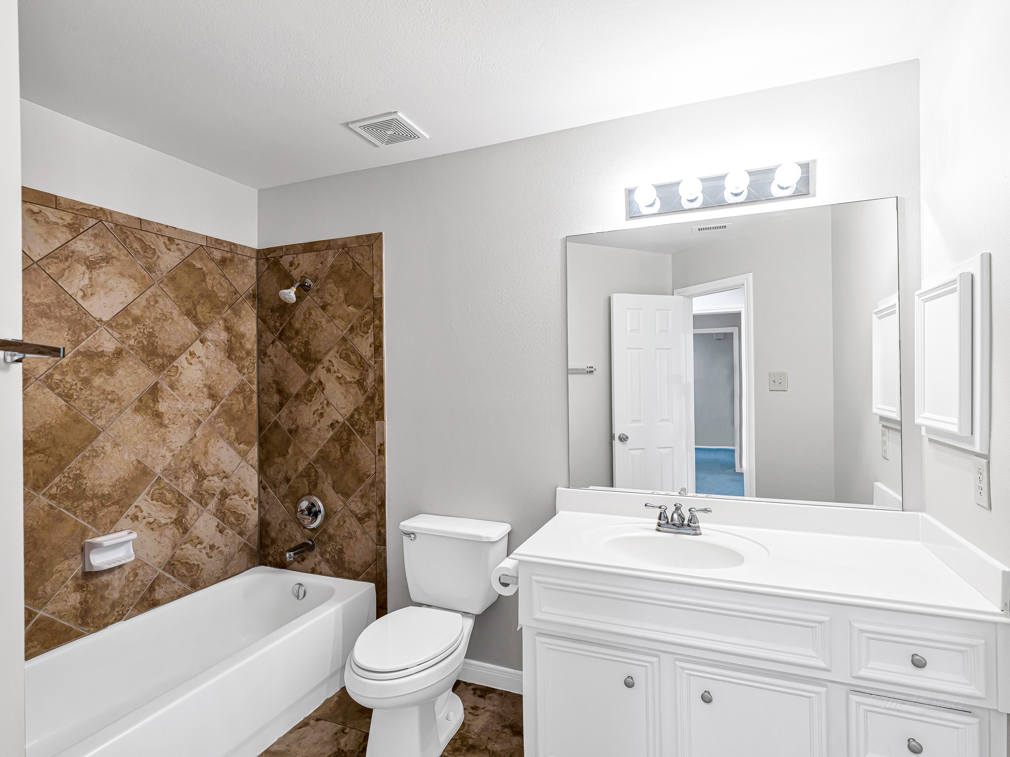 2714 Misty River Lane Richmond, TX 77406 - Photo 41 of 50 a bathroom with a sink a toilet and a mirror