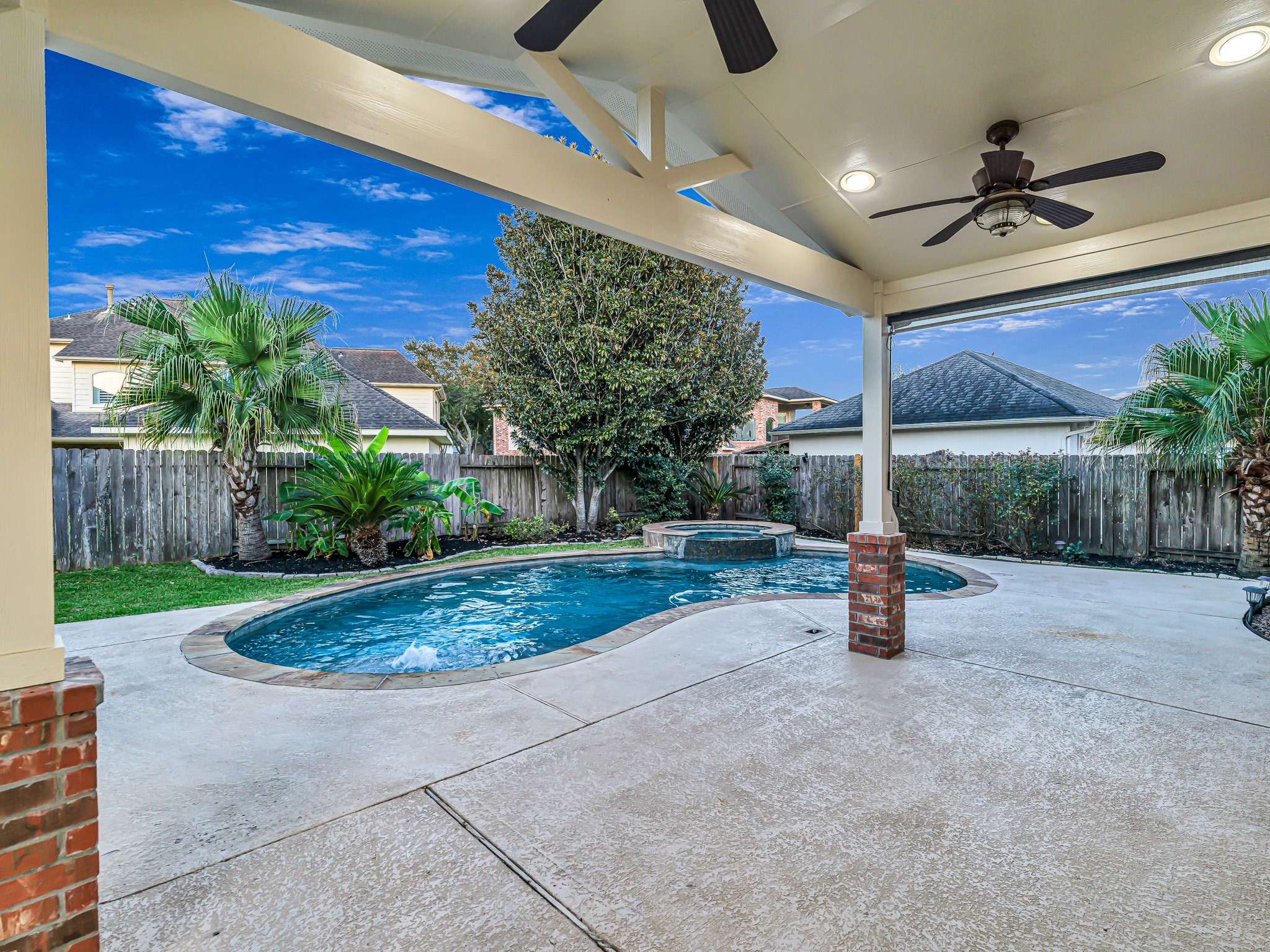 2714 Misty River Lane Richmond, TX 77406 - Photo 42 of 50 a view of a backyard with table and chairs