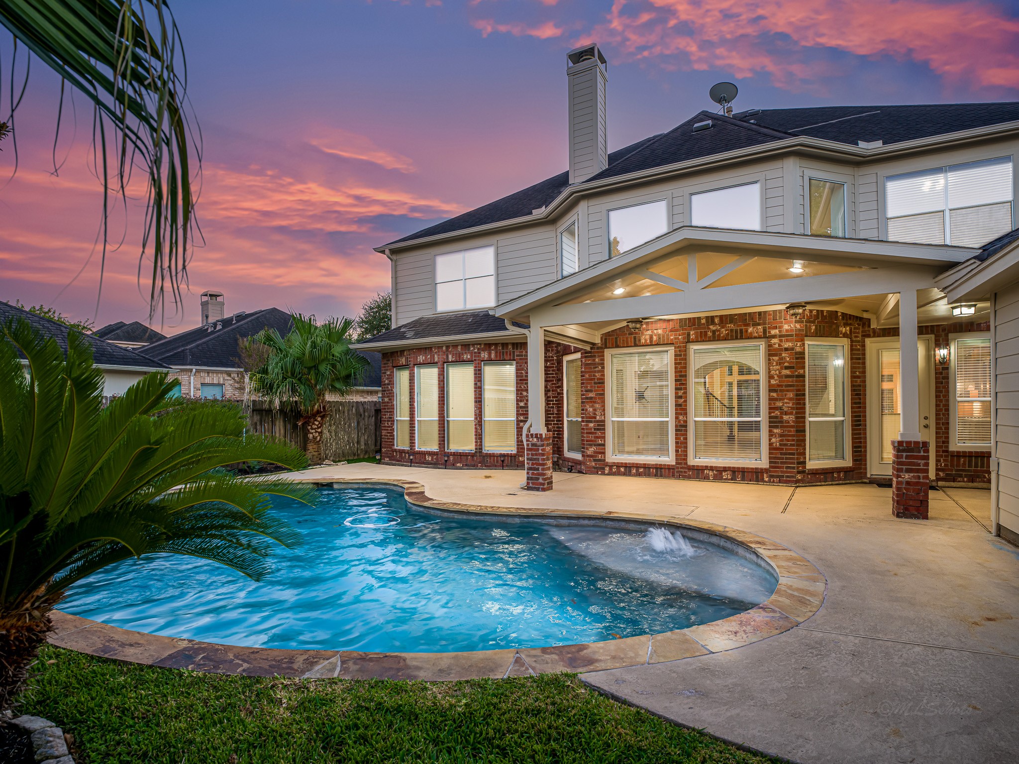 2714 Misty River Lane Richmond, TX 77406 - Photo 44 of 50 a view of a house with swimming pool and sitting area