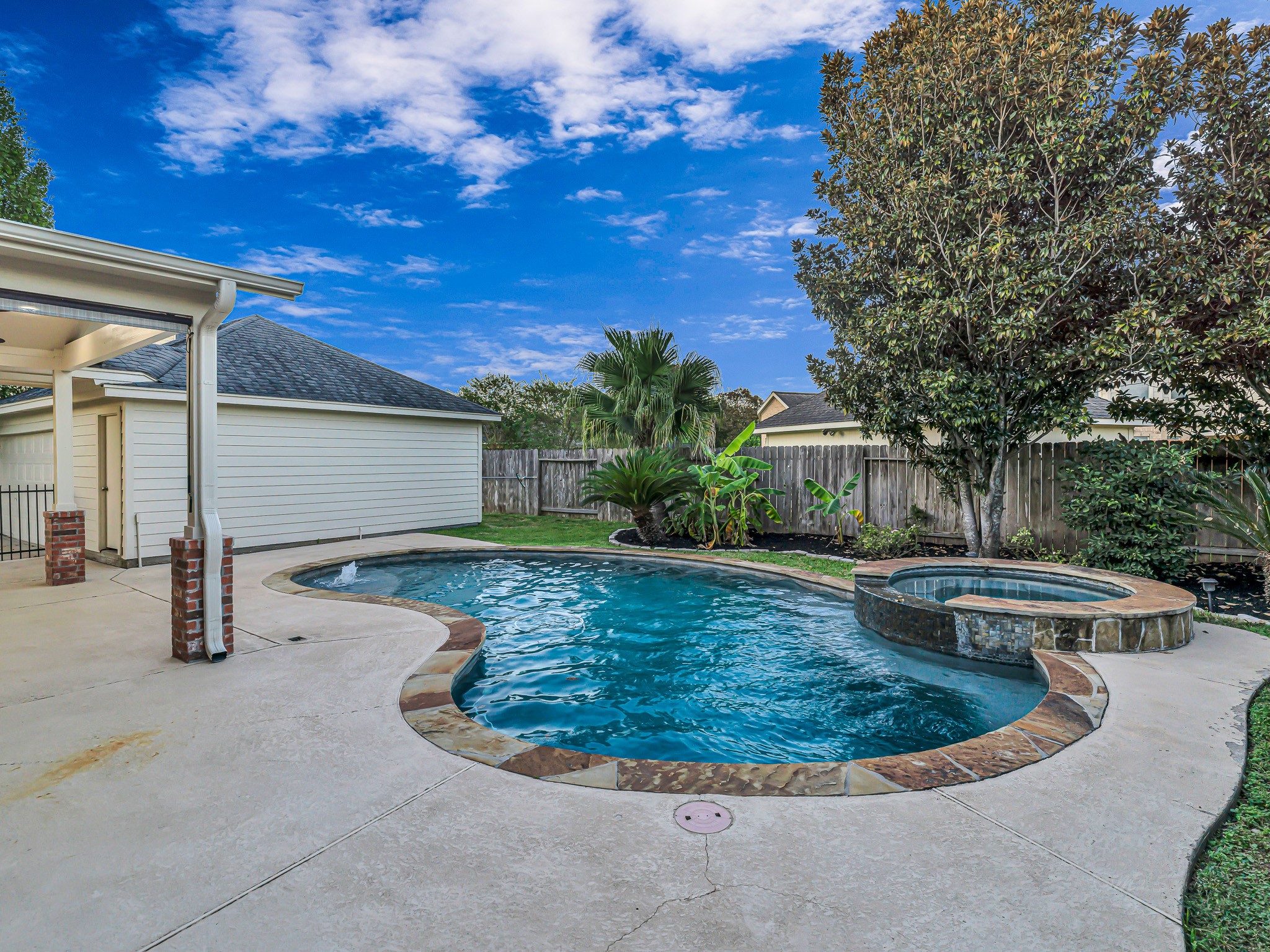2714 Misty River Lane Richmond, TX 77406 - Photo 47 of 50 a view of a house with swimming pool