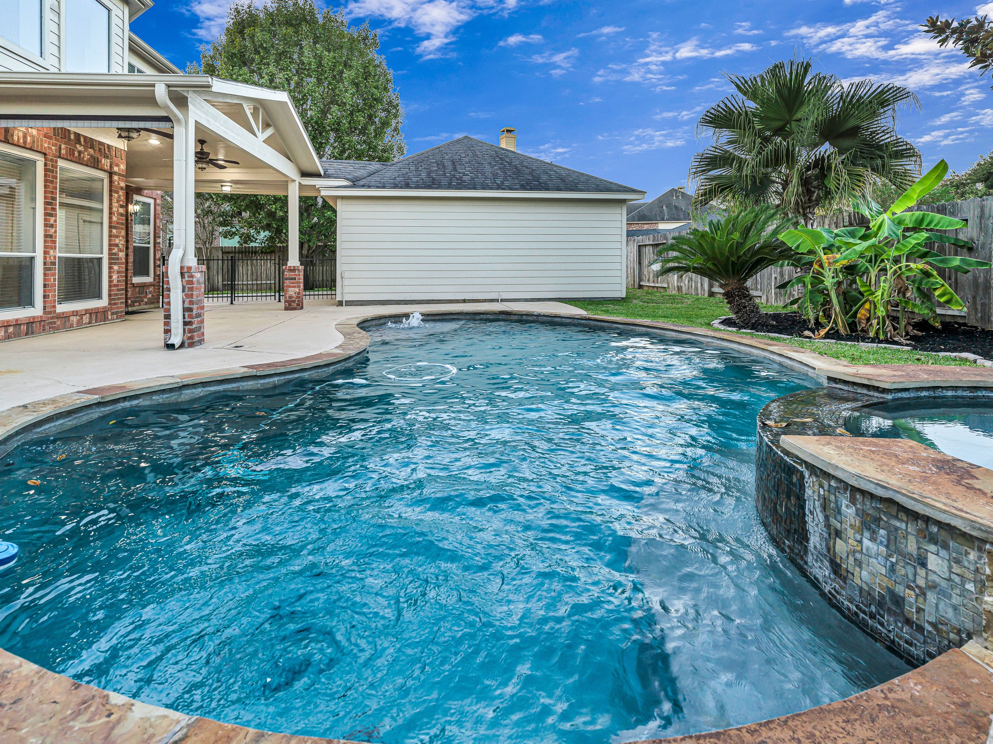 2714 Misty River Lane Richmond, TX 77406 - Photo 48 of 50 a front view of a house with porch