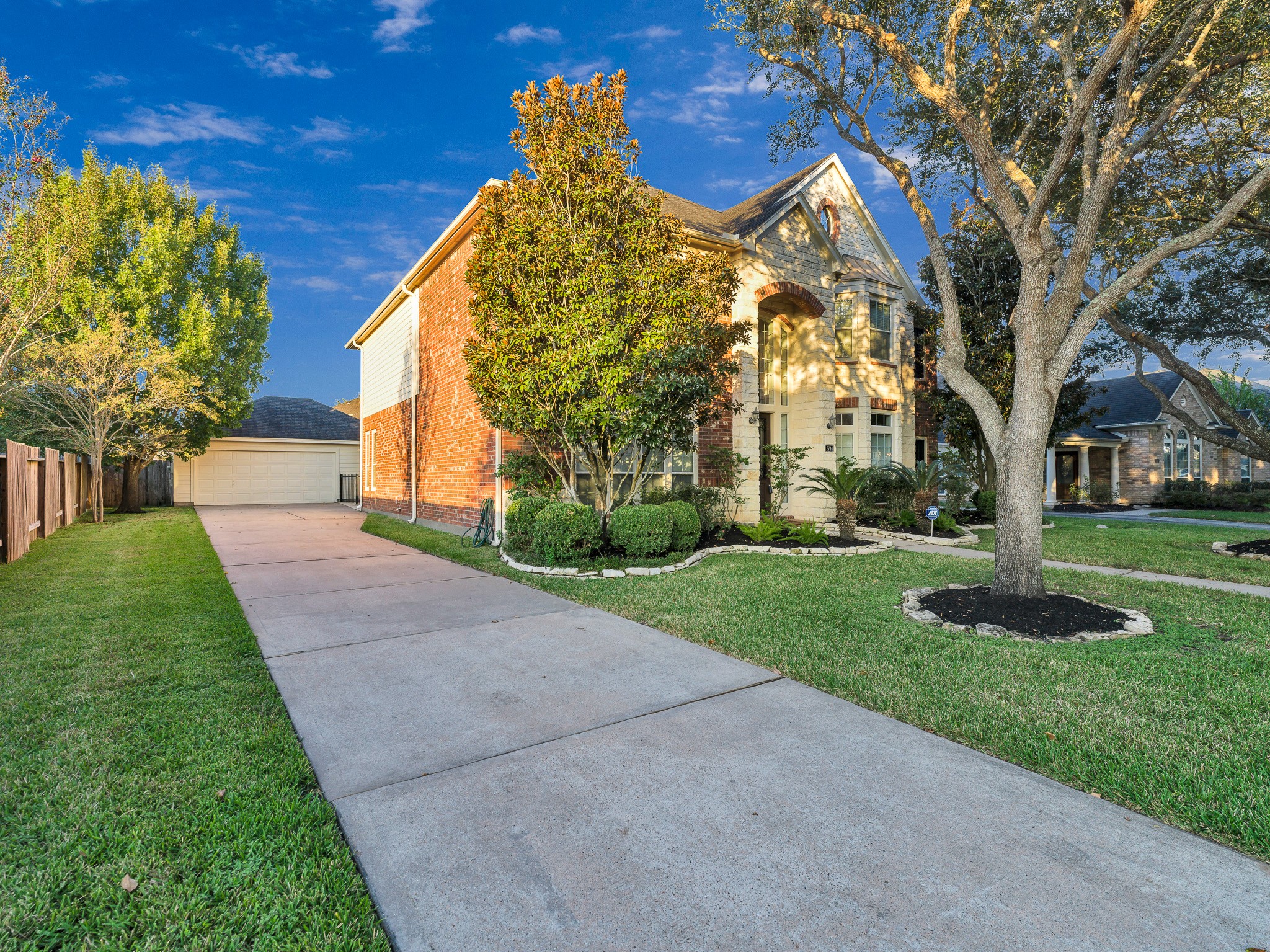 2714 Misty River Lane Richmond, TX 77406 - Photo 49 of 50 a view of a yard with plants and trees