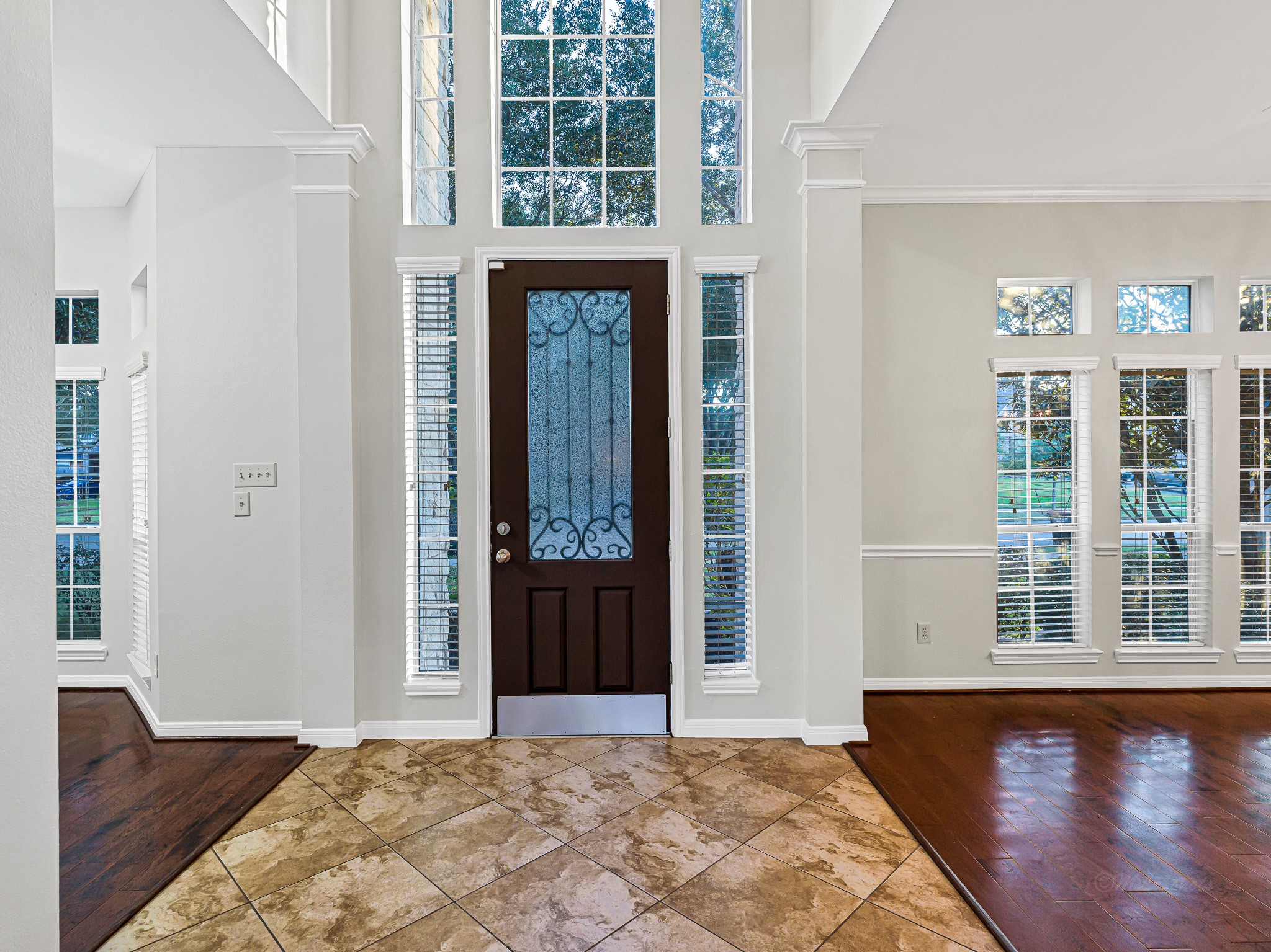 2714 Misty River Lane Richmond, TX 77406 - Photo 7 of 50 a view of a bedroom with wooden floor and a window