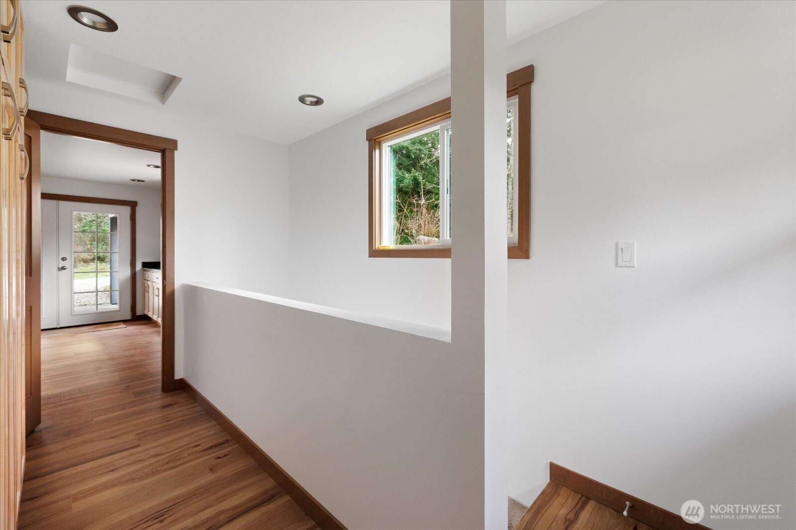 2341 Libbey Road Coupeville, WA 98239 - Photo 17 of 36 a view of hallway with wooden floor