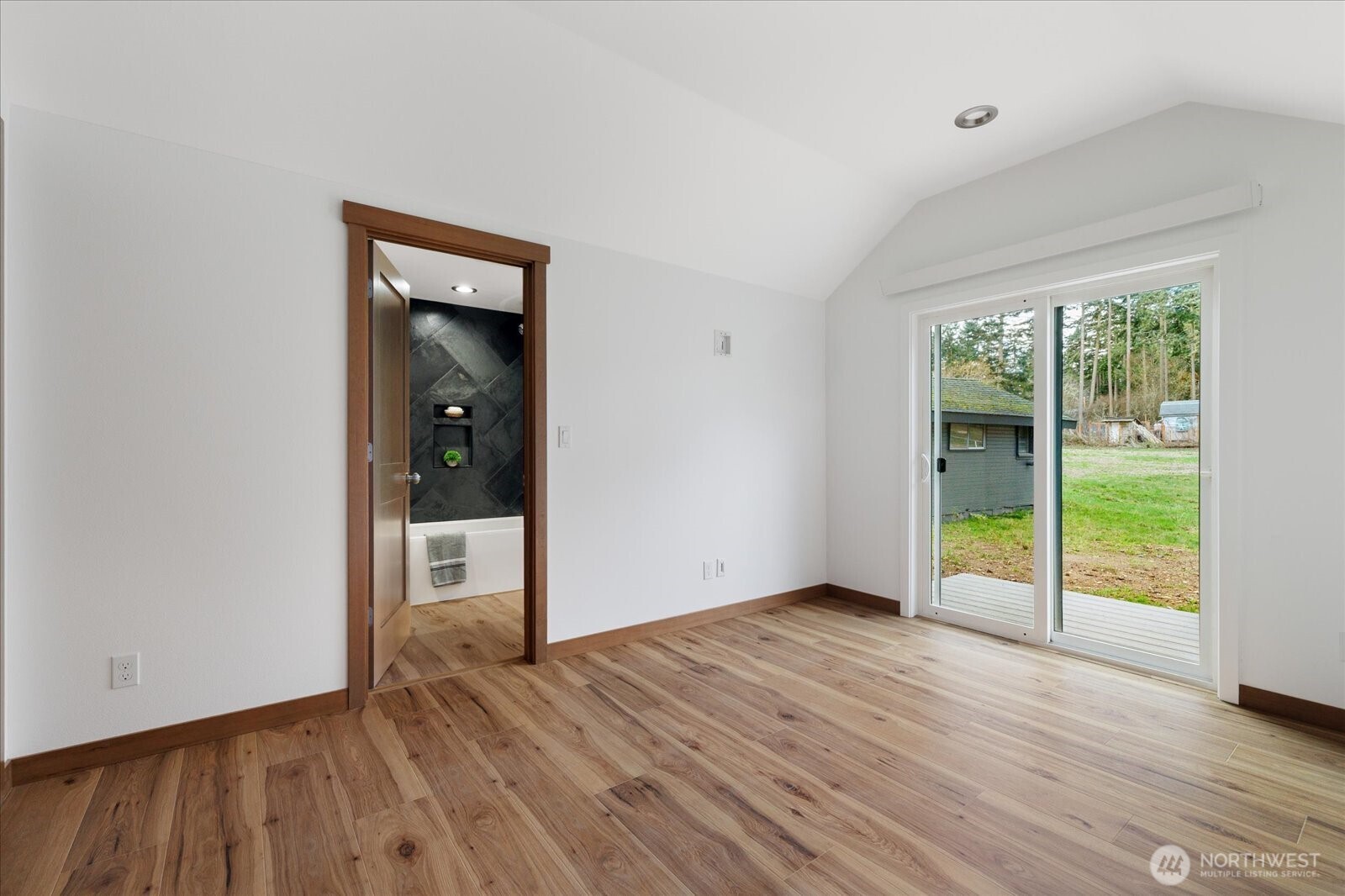 2341 Libbey Road Coupeville, WA 98239 - Photo 21 of 36 wooden floor in an empty room and window