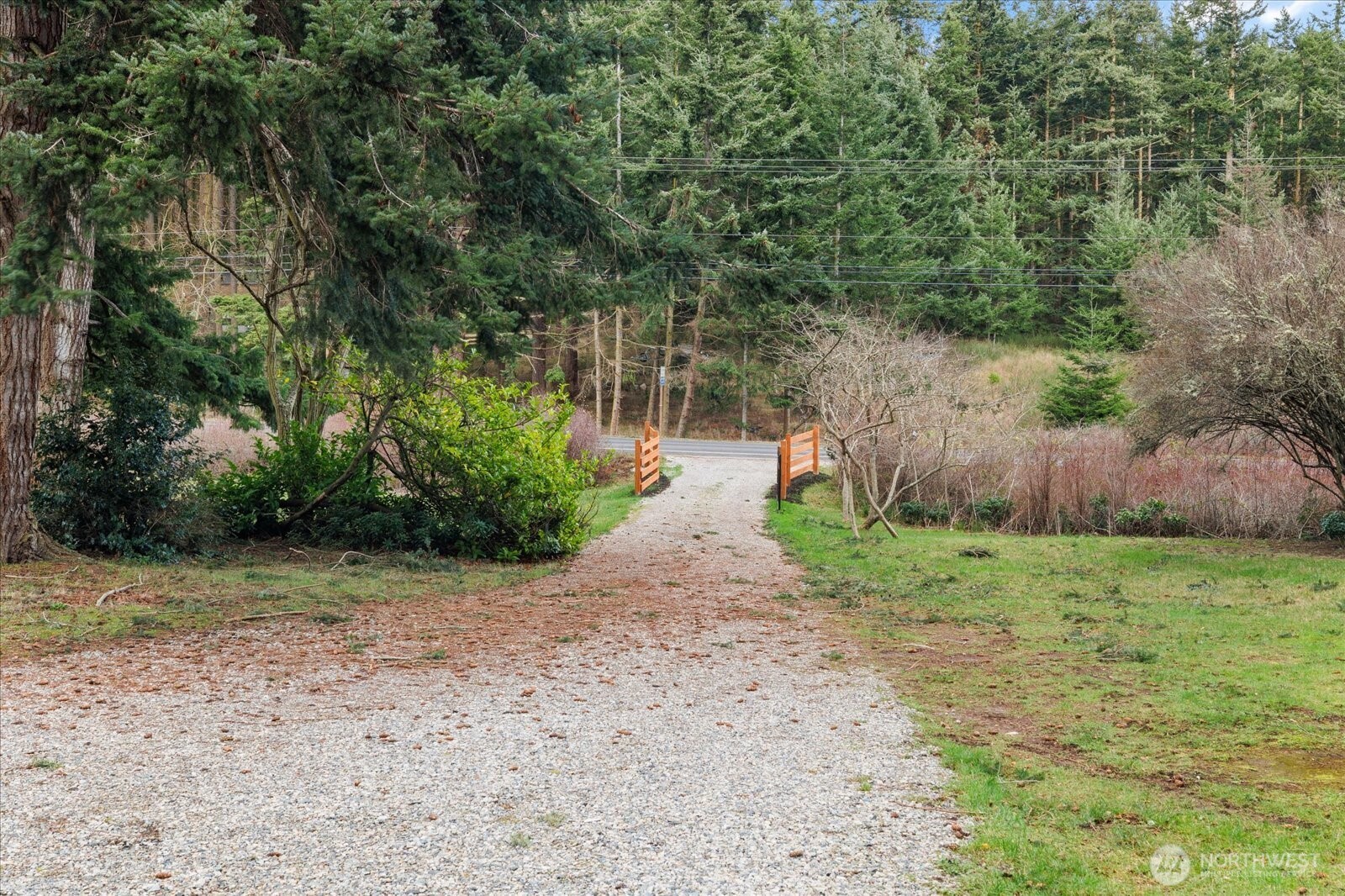 2341 Libbey Road Coupeville, WA 98239 - Photo 27 of 36 a backyard of a house with lots of green space