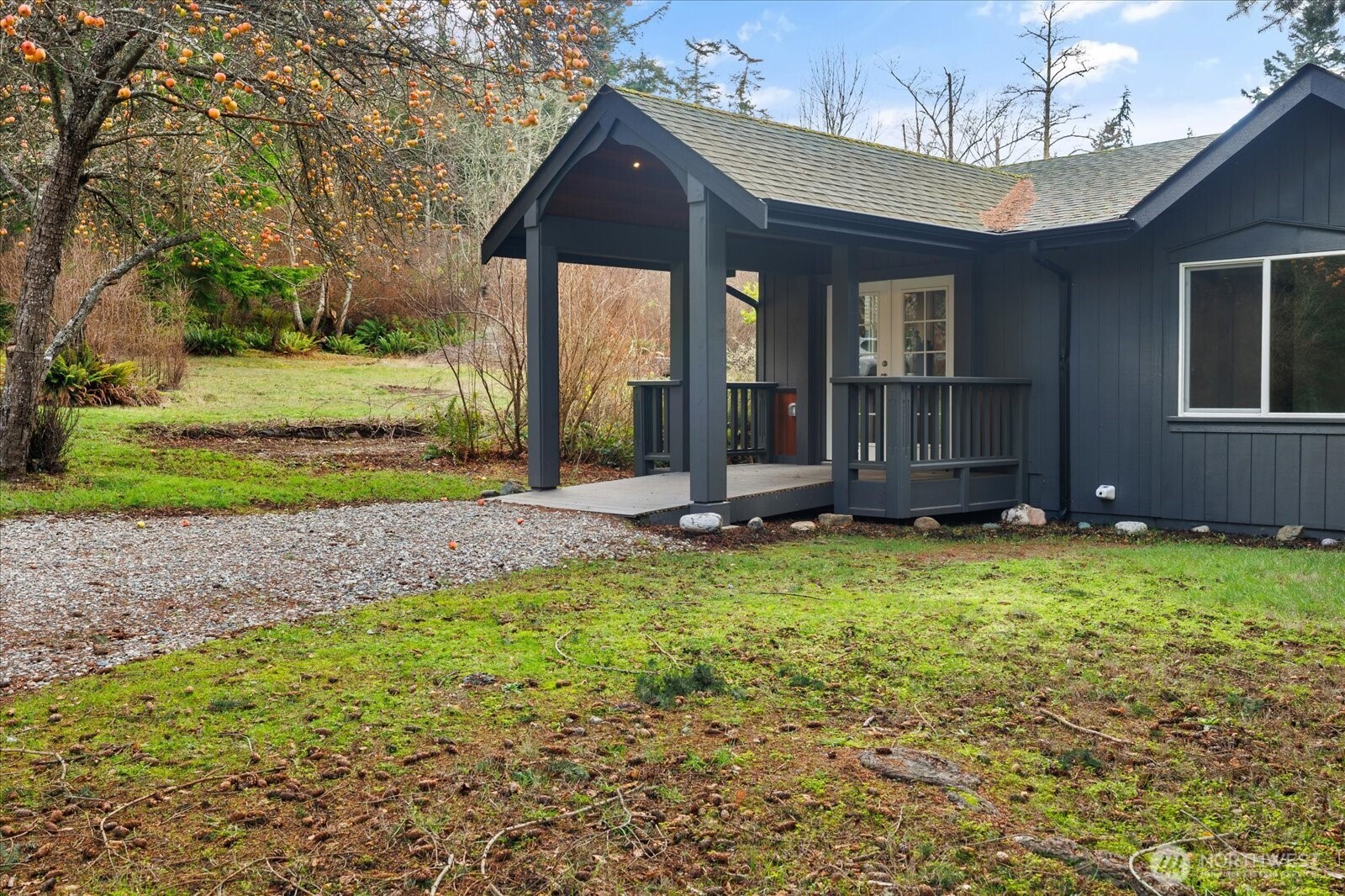 2341 Libbey Road Coupeville, WA 98239 - Photo 28 of 36 a view of a house with backyard and garden