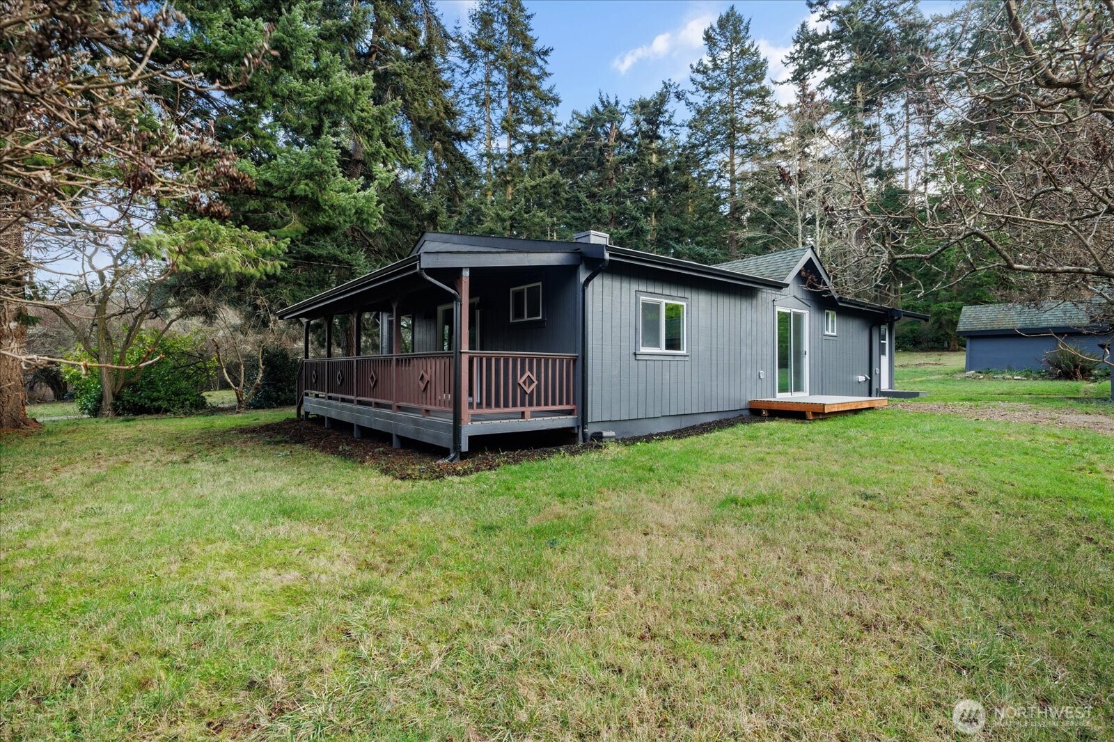 2341 Libbey Road Coupeville, WA 98239 - Photo 32 of 36 a view of a house with a yard