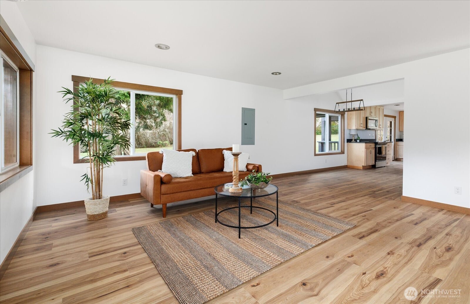 2341 Libbey Road Coupeville, WA 98239 - Photo 7 of 36 a living room with furniture and a wooden floor