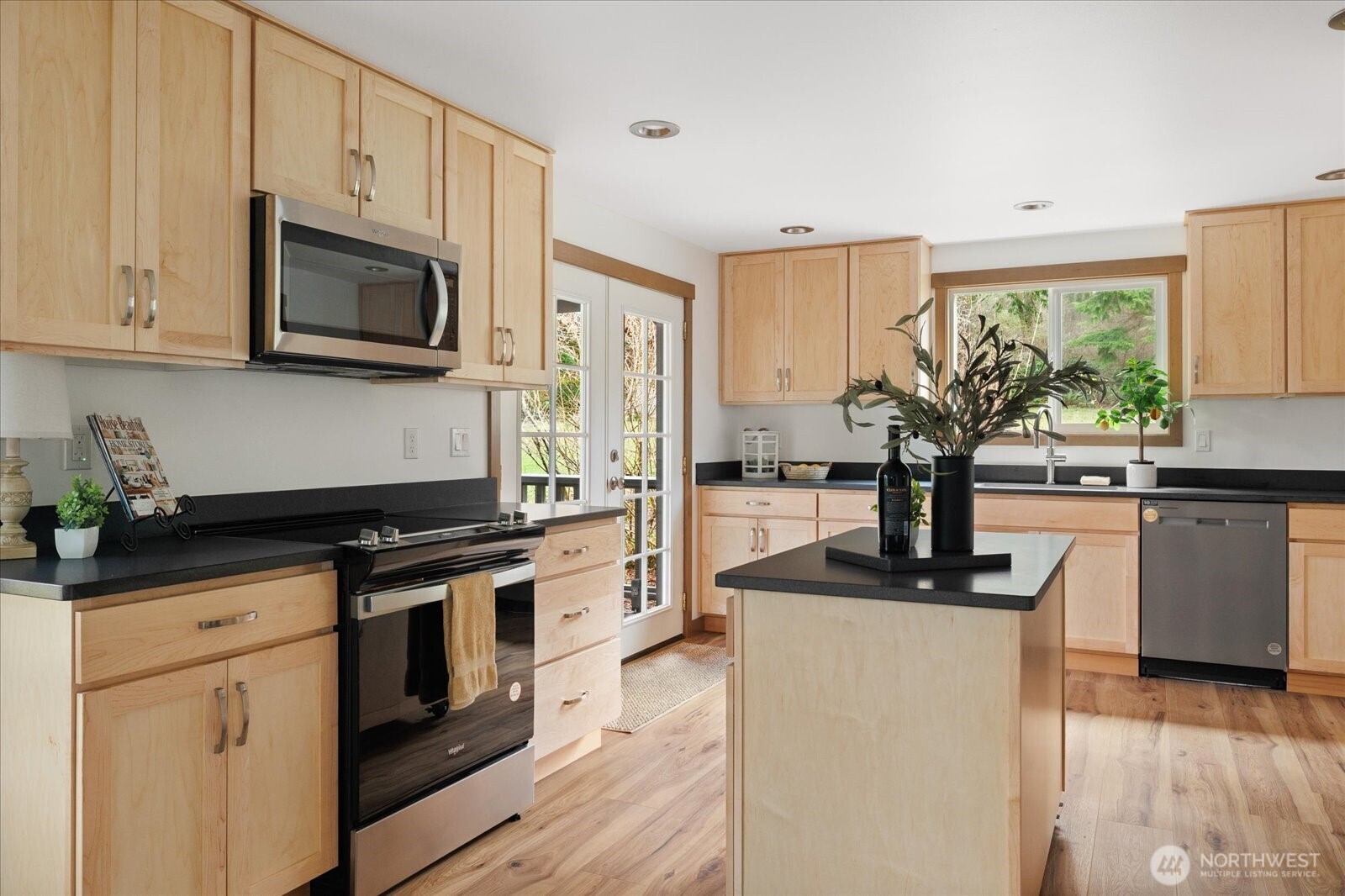 2341 Libbey Road Coupeville, WA 98239 - Photo 10 of 36 a kitchen with cabinets appliances and a window
