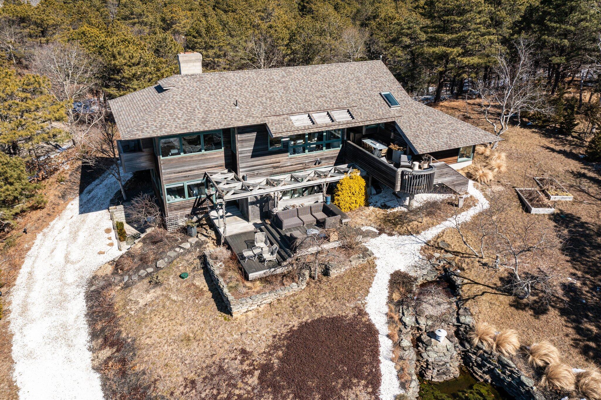 11 Sandpiper Road Truro, MA 02666 - Photo 54 of 62 an aerial view of a house with swimming pool and patio