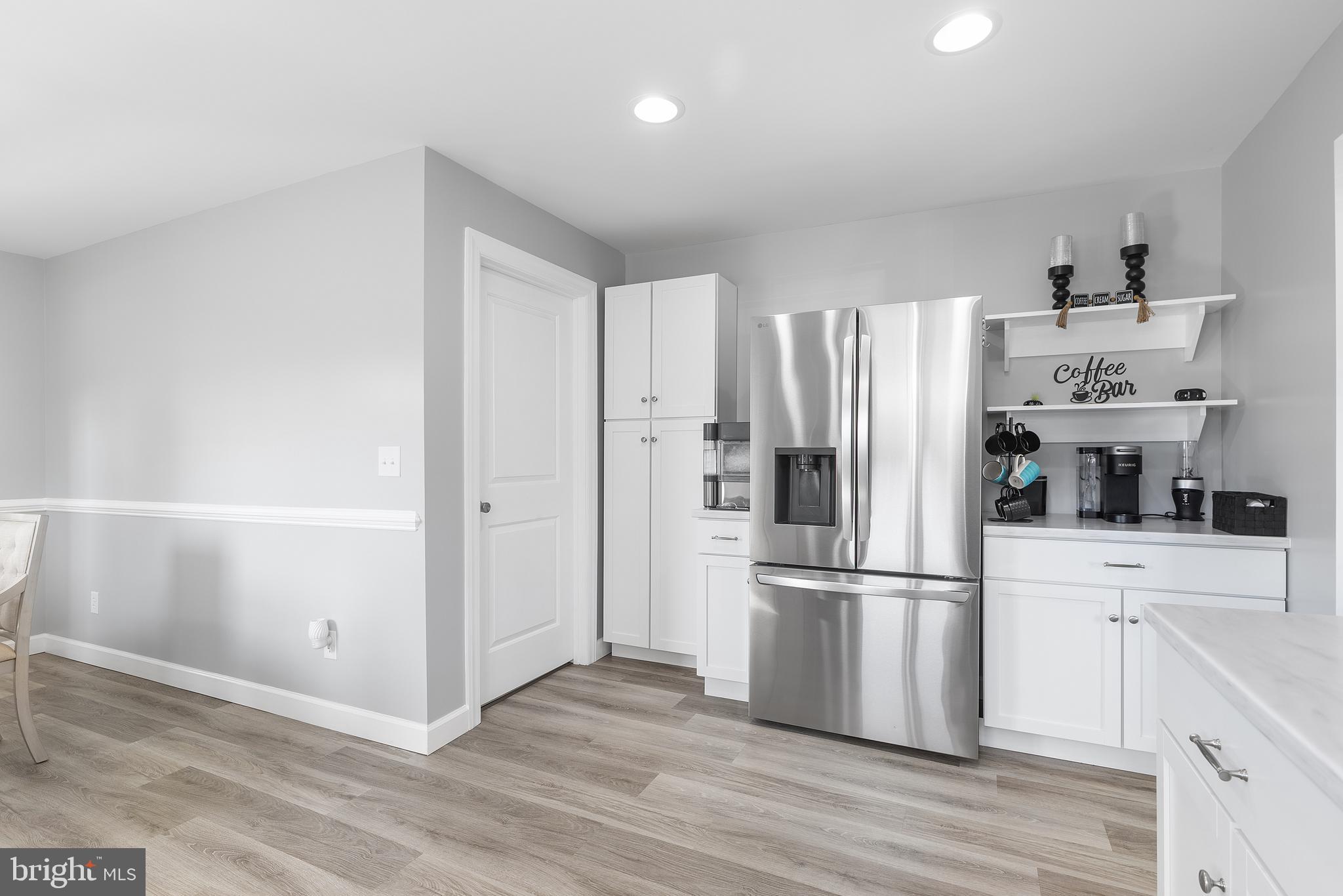 25485 Hignutt Road Denton, MD 21629 - Photo 7 of 52 a kitchen with stainless steel appliances a refrigerator and a sink