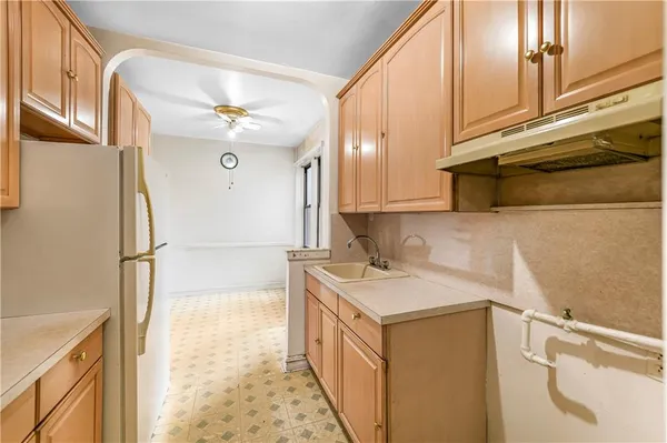 a bathroom with a sink a vanity and a mirror
