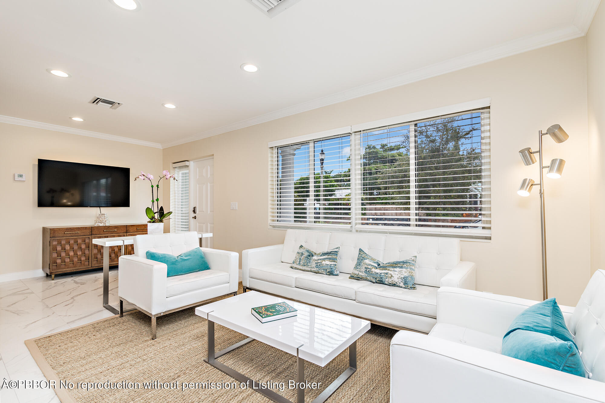 369 Valley Forge Road West Palm Beach, FL 33405 - Photo 11 of 19 a living room with furniture and a flat screen tv