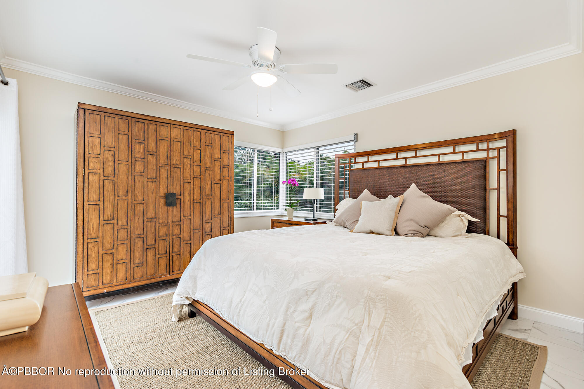 369 Valley Forge Road West Palm Beach, FL 33405 - Photo 13 of 19 a bedroom with a large bed and a window