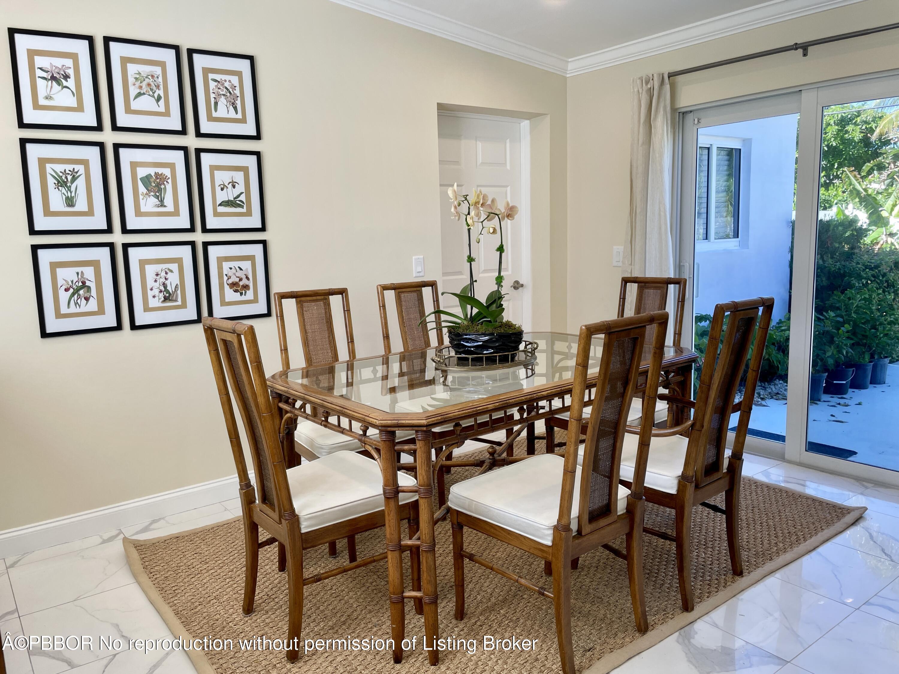 369 Valley Forge Road West Palm Beach, FL 33405 - Photo 18 of 19 a view of a dining room with furniture