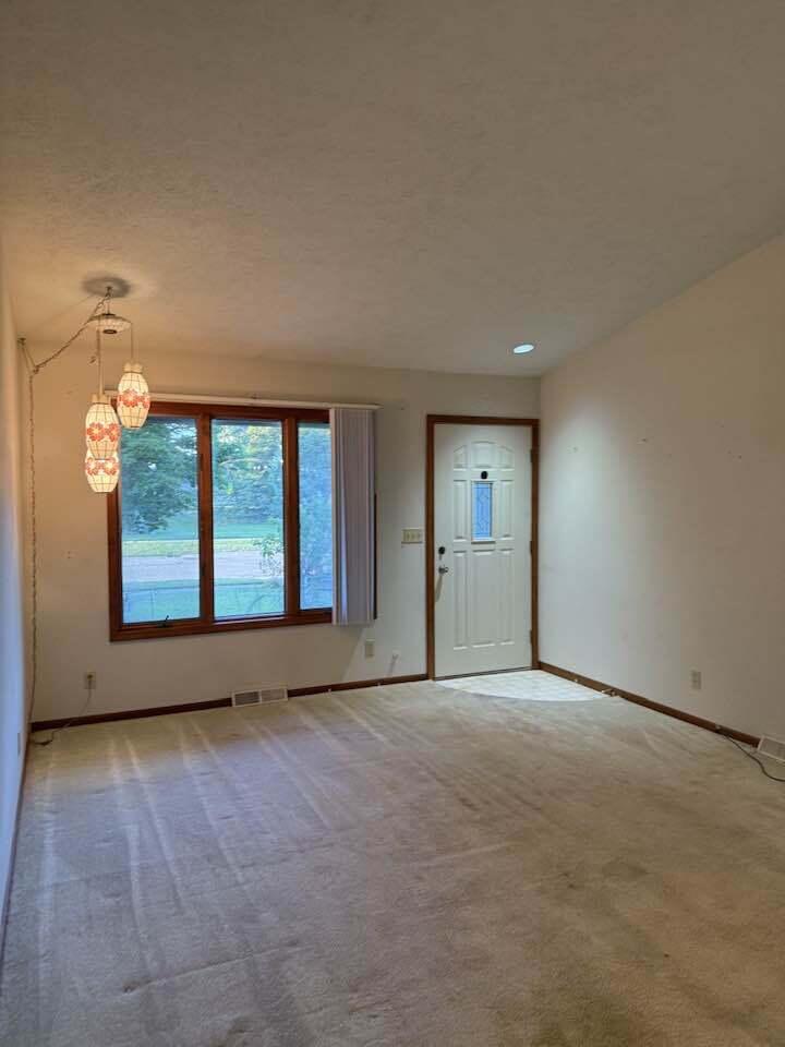 137 Ida Red Avenue Sparta, MI 49345 - Photo 2 of 12 137 Ida Red frontentry