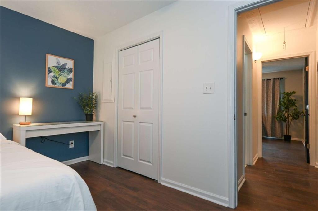 398 Arch Street Athens, GA 30601 - Photo 19 of 27 a room with a bed and a desk