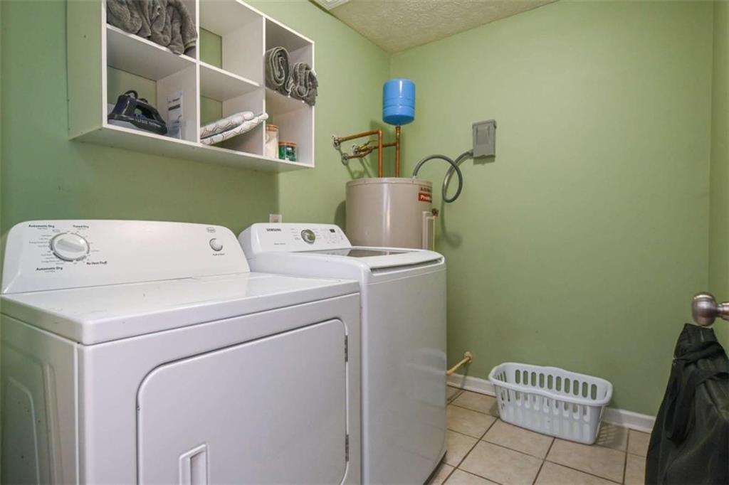 398 Arch Street Athens, GA 30601 - Photo 27 of 27 a utility room with dryer and washer