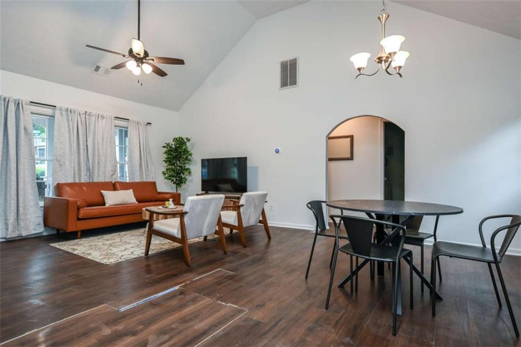 398 Arch Street Athens, GA 30601 - Photo 6 of 27 a view of a dining room with furniture and wooden floor