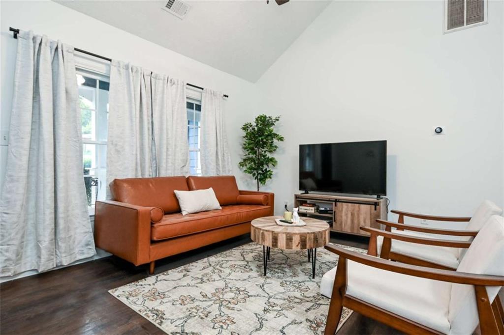 398 Arch Street Athens, GA 30601 - Photo 9 of 27 a living room with furniture and a flat screen tv