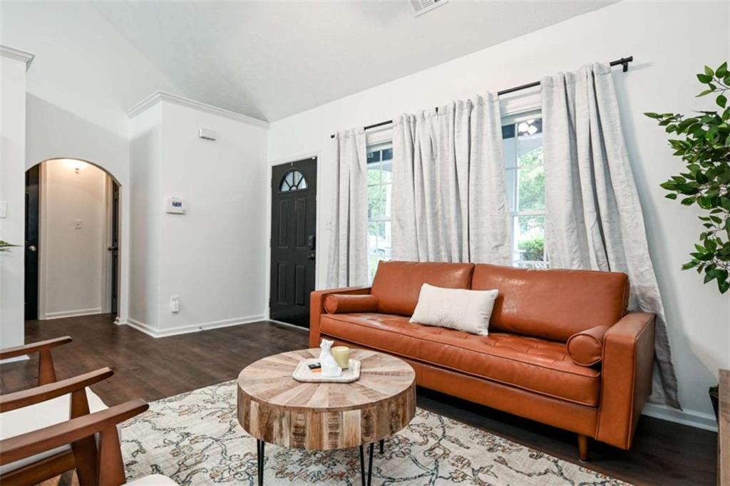 398 Arch Street Athens, GA 30601 - Photo 10 of 27 a living room with furniture and wooden floor