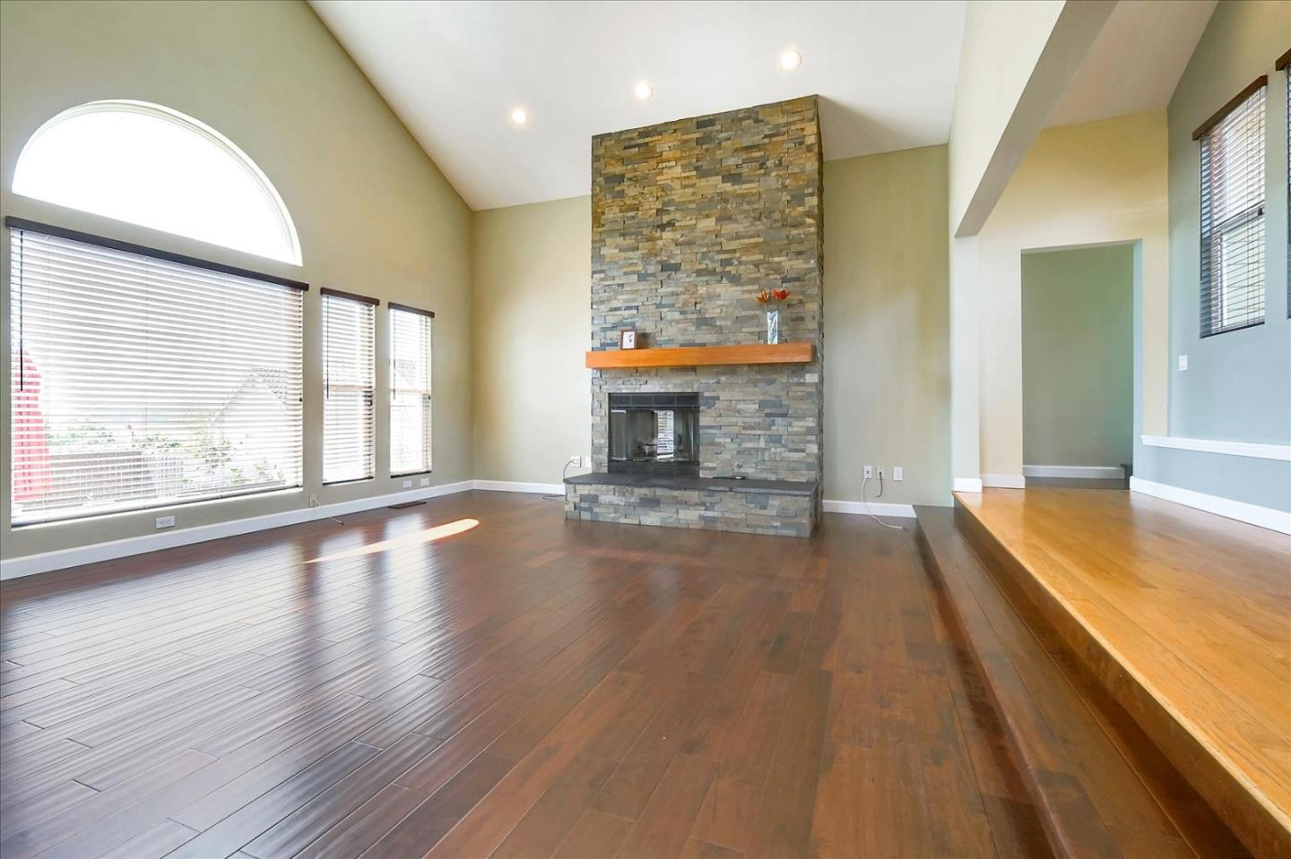 7128 Danko Drive Aptos, CA 95003 - Photo 14 of 47 wooden floor in an empty room with a fireplace