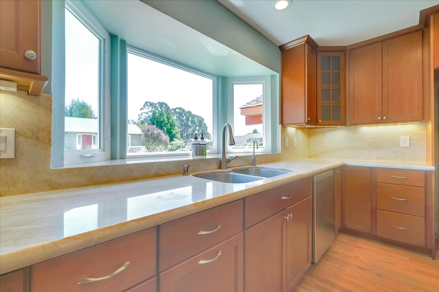 7128 Danko Drive Aptos, CA 95003 - Photo 19 of 47 a kitchen with a sink and large window
