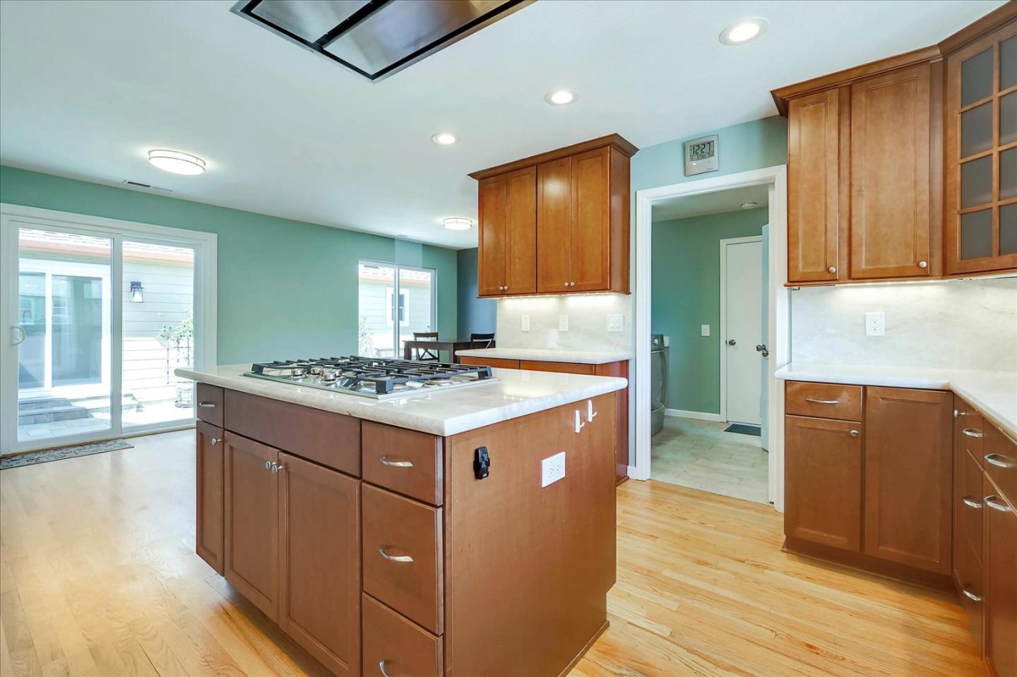 7128 Danko Drive Aptos, CA 95003 - Photo 21 of 47 a kitchen with a stove and a refrigerator