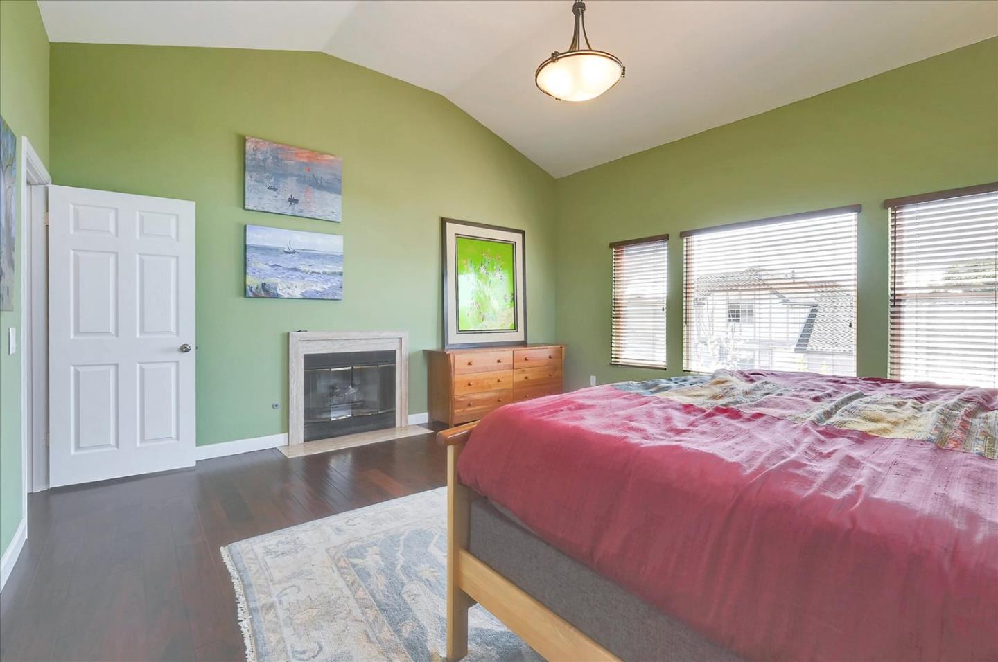 7128 Danko Drive Aptos, CA 95003 - Photo 30 of 47 a bedroom with a bed and a fireplace