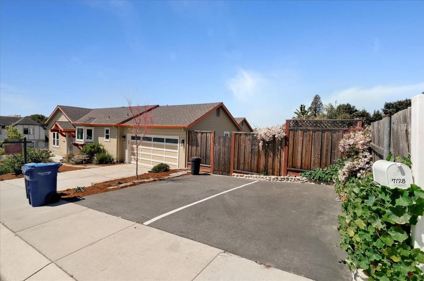 7128 Danko Drive Aptos, CA 95003 - Photo 3 of 47 a front view of a house with garden