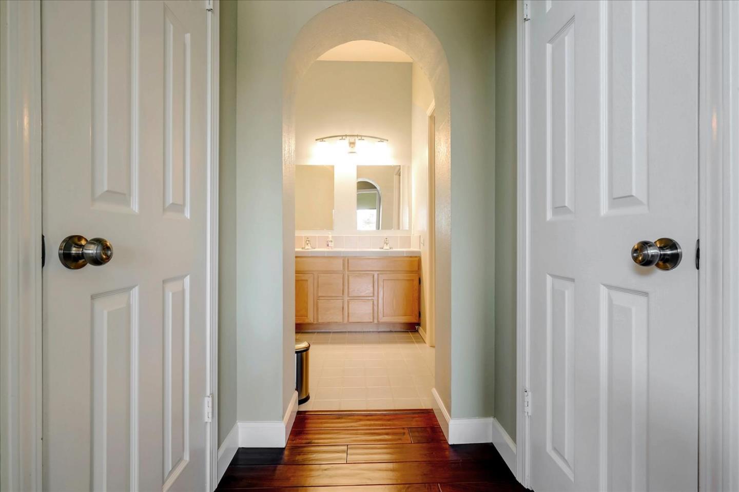 7128 Danko Drive Aptos, CA 95003 - Photo 35 of 47 a view of a hallway with wooden floor and staircase
