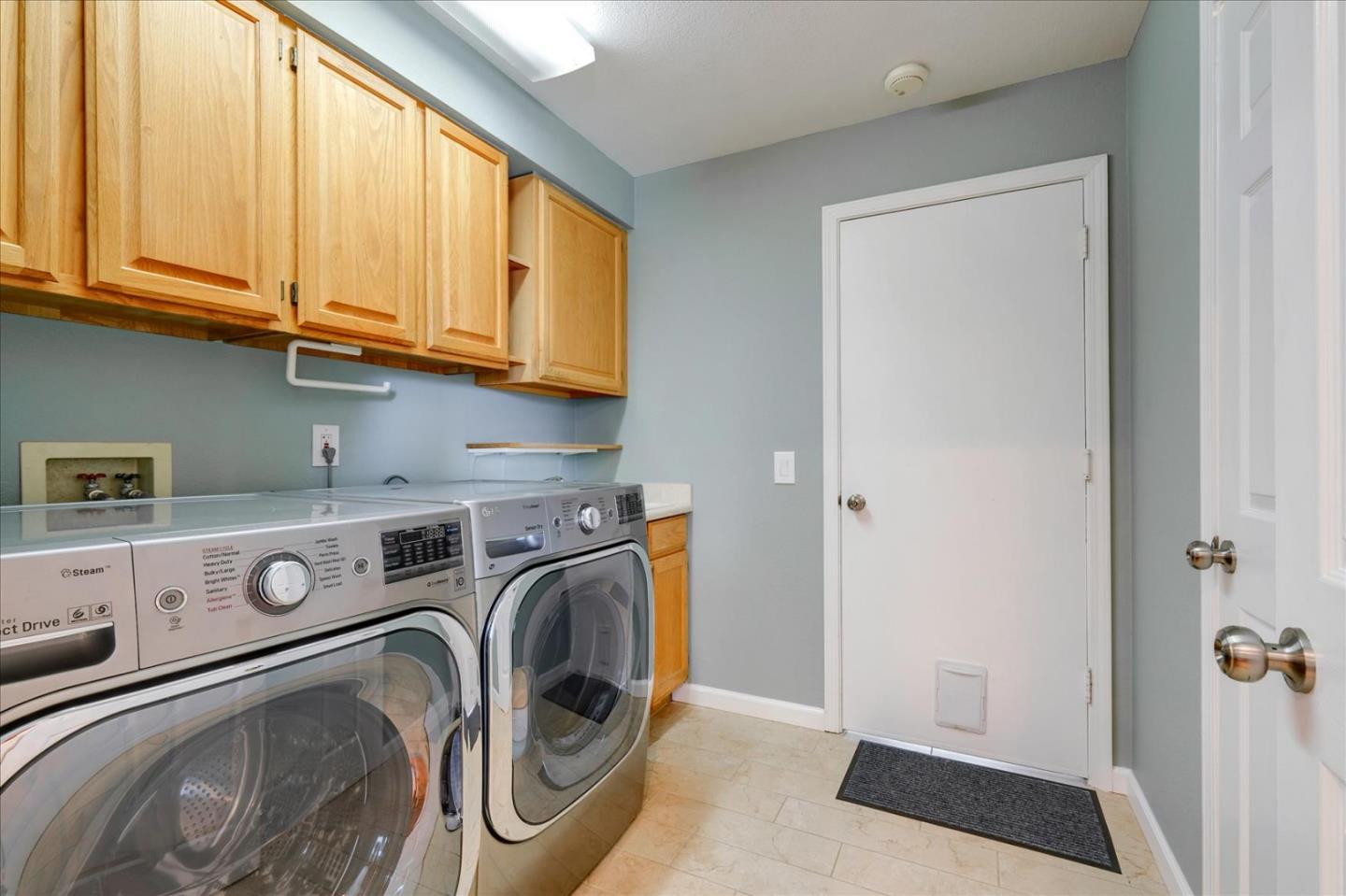 7128 Danko Drive Aptos, CA 95003 - Photo 38 of 47 a utility room with dryer and washer