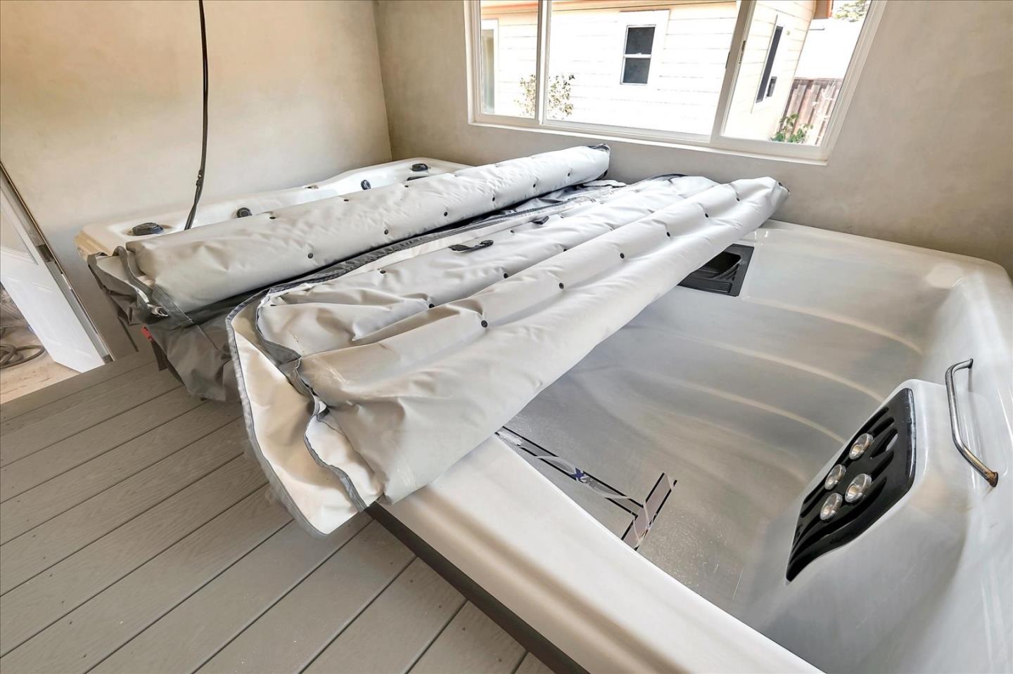 7128 Danko Drive Aptos, CA 95003 - Photo 41 of 47 a bed sitting in a bedroom next to a window