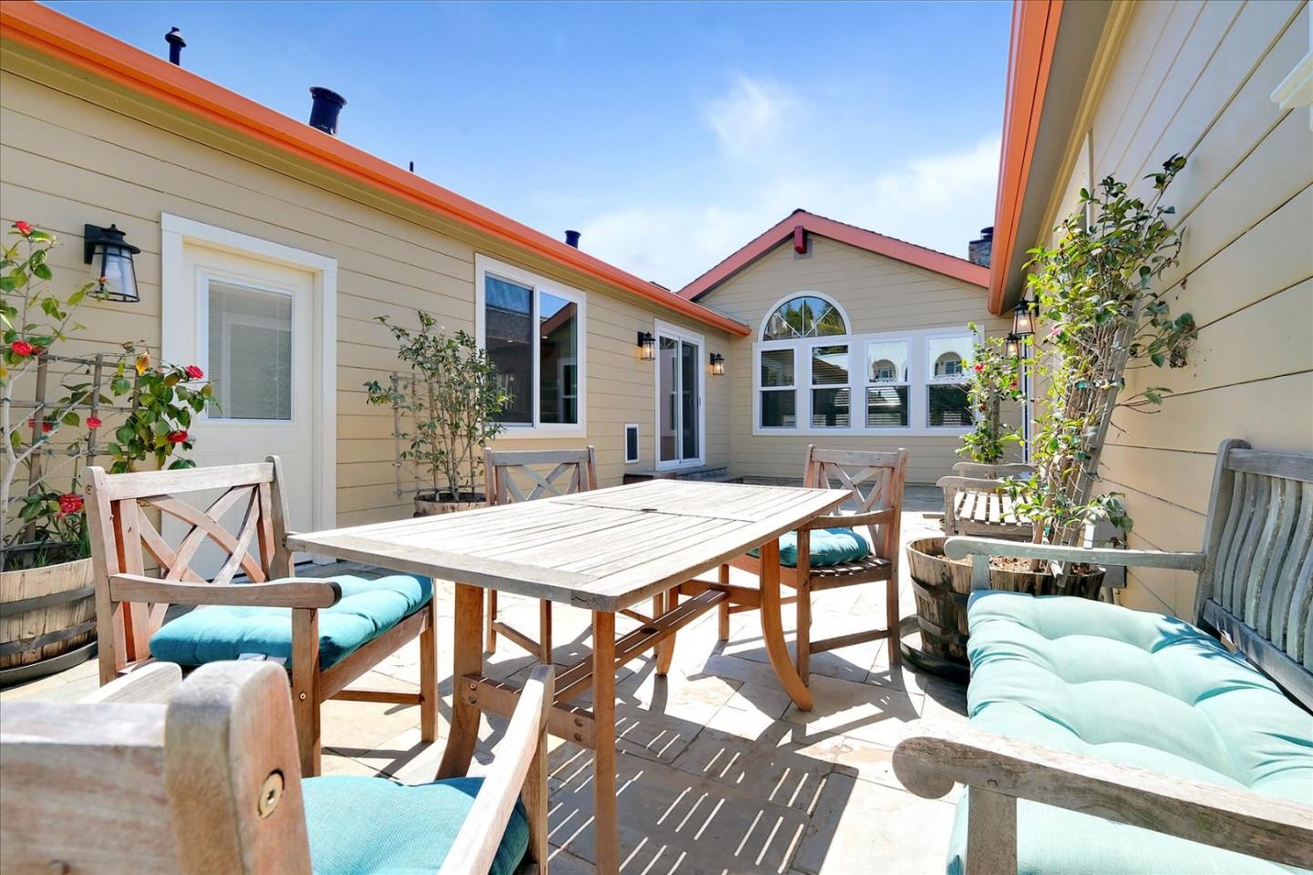 7128 Danko Drive Aptos, CA 95003 - Photo 43 of 47 a view of a house with patio and a yard