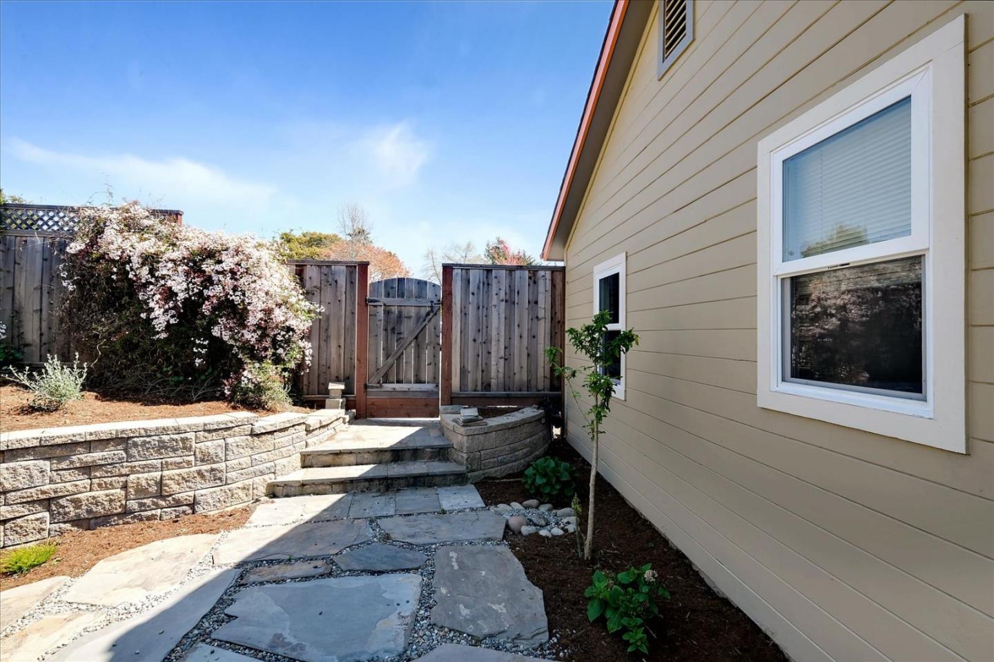 7128 Danko Drive Aptos, CA 95003 - Photo 47 of 47 a backyard of a house with outdoor seating