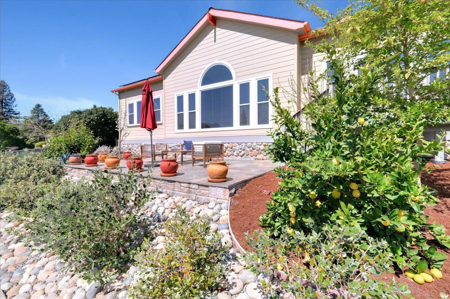 7128 Danko Drive Aptos, CA 95003 - Photo 6 of 47 a front view of a house with a yard