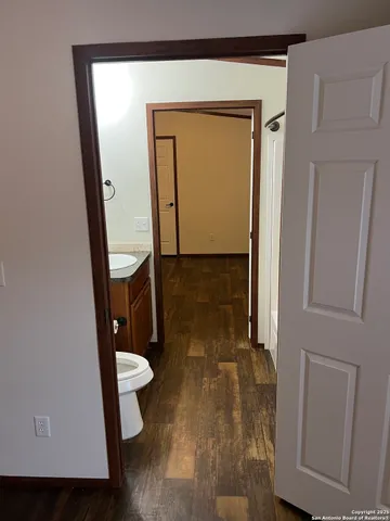 view of a bathroom with a sink and a mirror