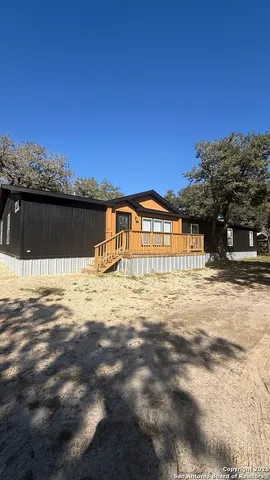 a view of swimming pool with a yard