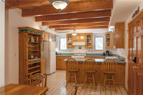 a dining table with chairs and closet