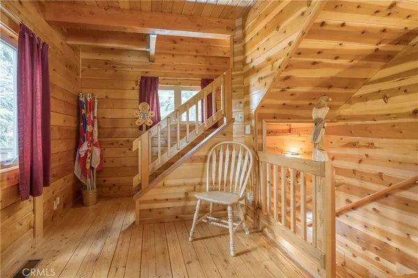 a view of entryway with wooden floor